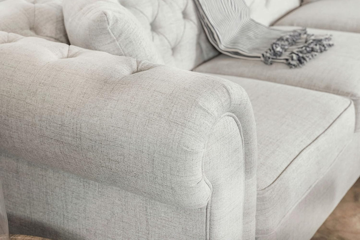 Cecilia Upholstered Tufted Sectional with Reversible Chaise In Oatmeal