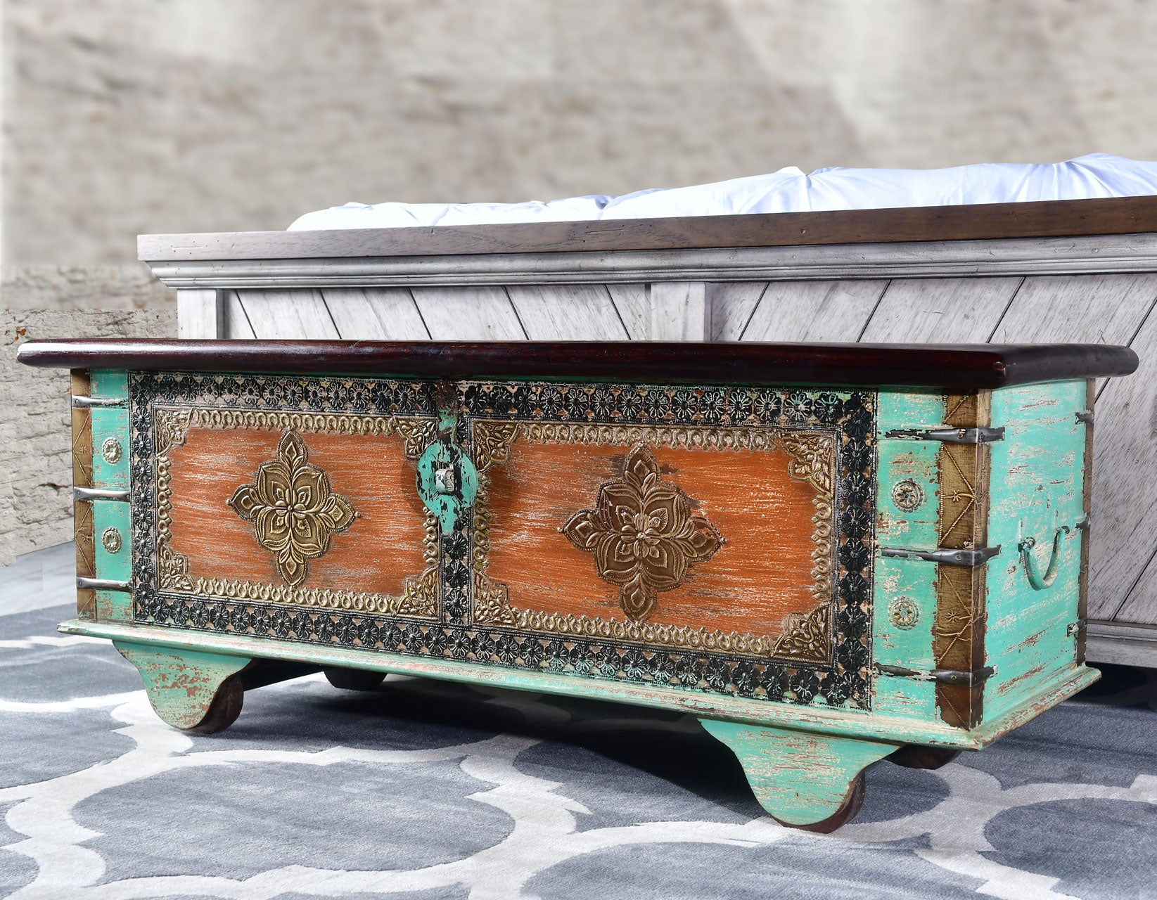 Alma Boho Style Multi Color Storage Trunk Coffee Table With Wheels